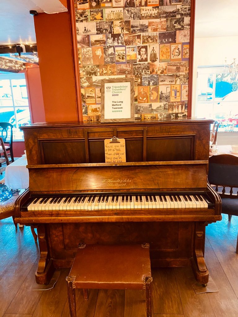 our piano in our tearoom